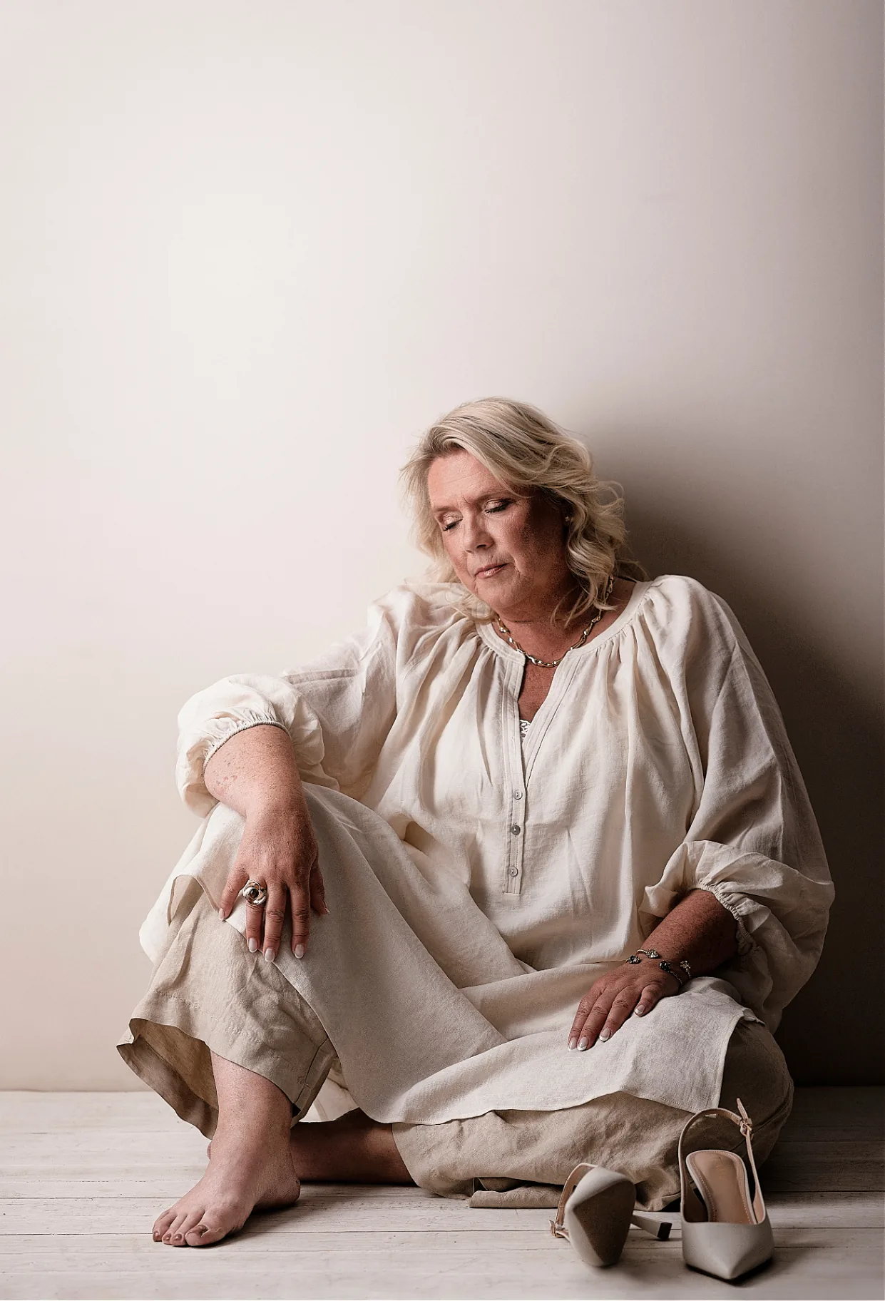 Camilla Ma Ra seated, composed