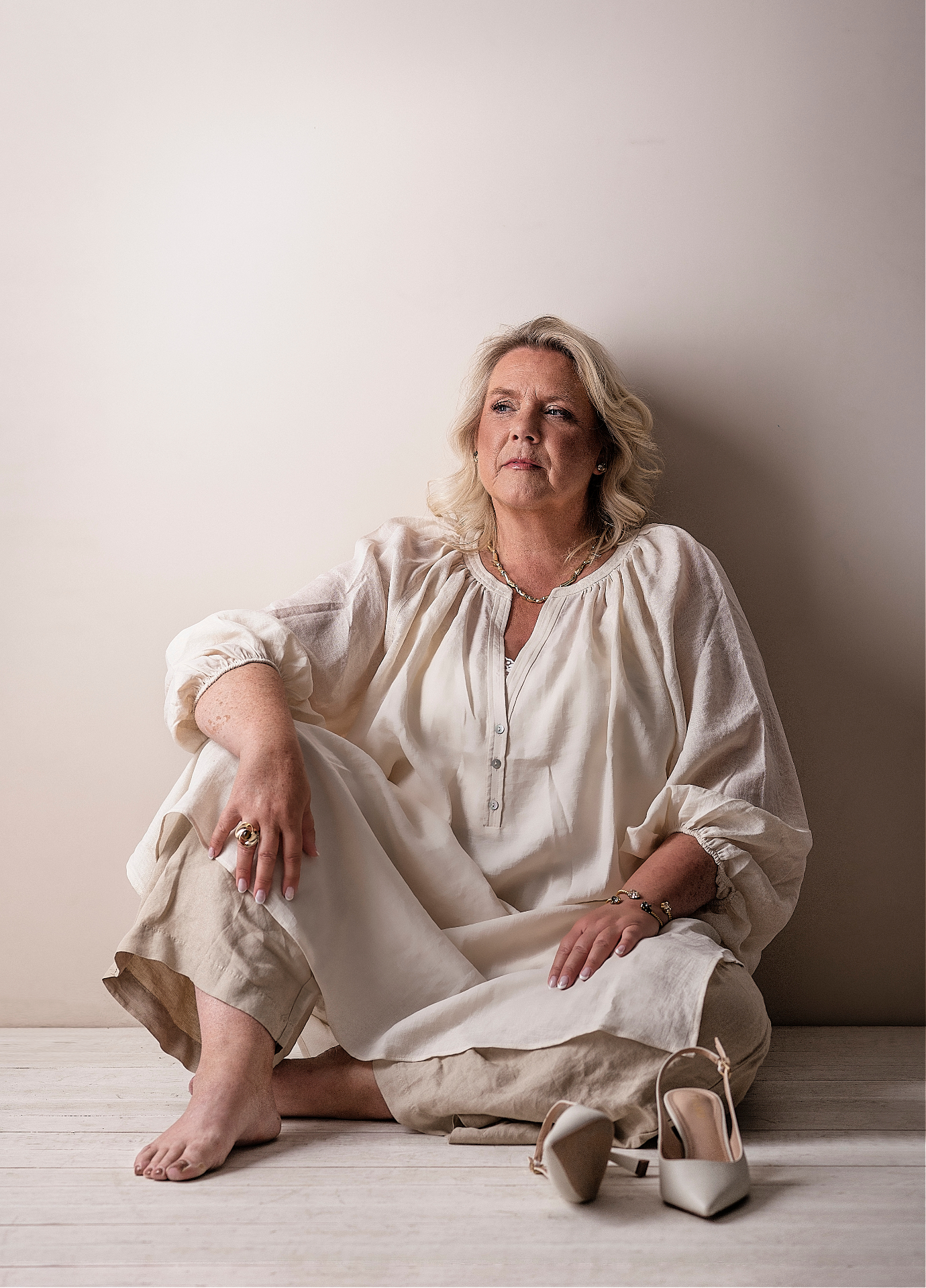Camilla Ma Ra seated, in conversation